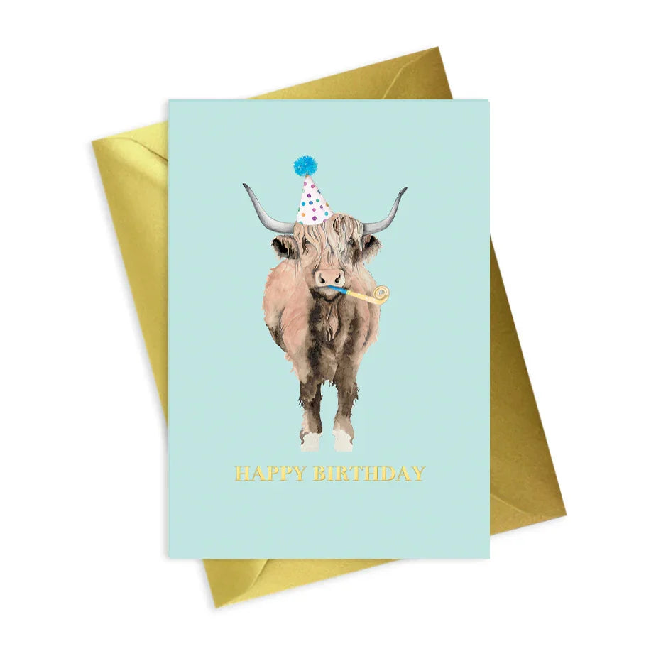 Highland cow in party hat on blue happy birthday card with gold envelope