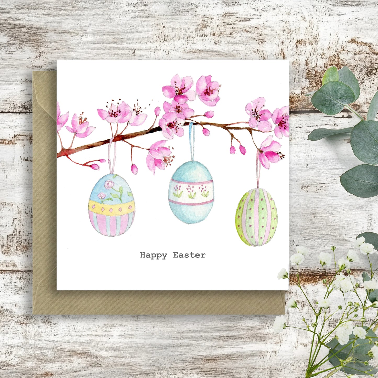 Handcrafted Easter card with painted eggs and blossom branch, Crumble and Core boxed gift.