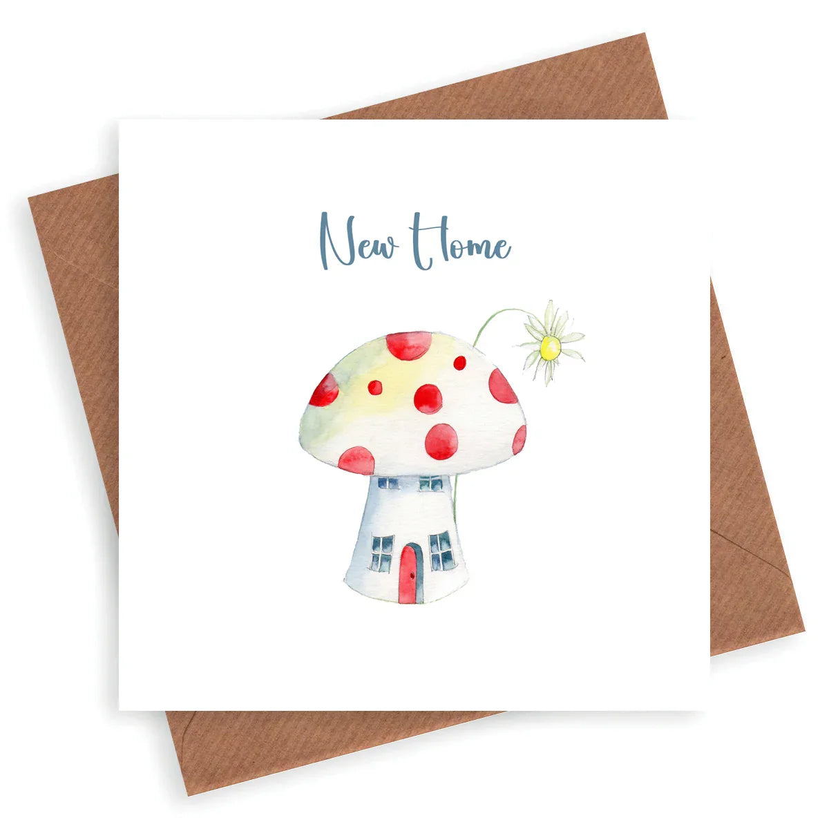 Handmade new home card with watercolor red spotted mushroom house and daisy, on kraft envelope