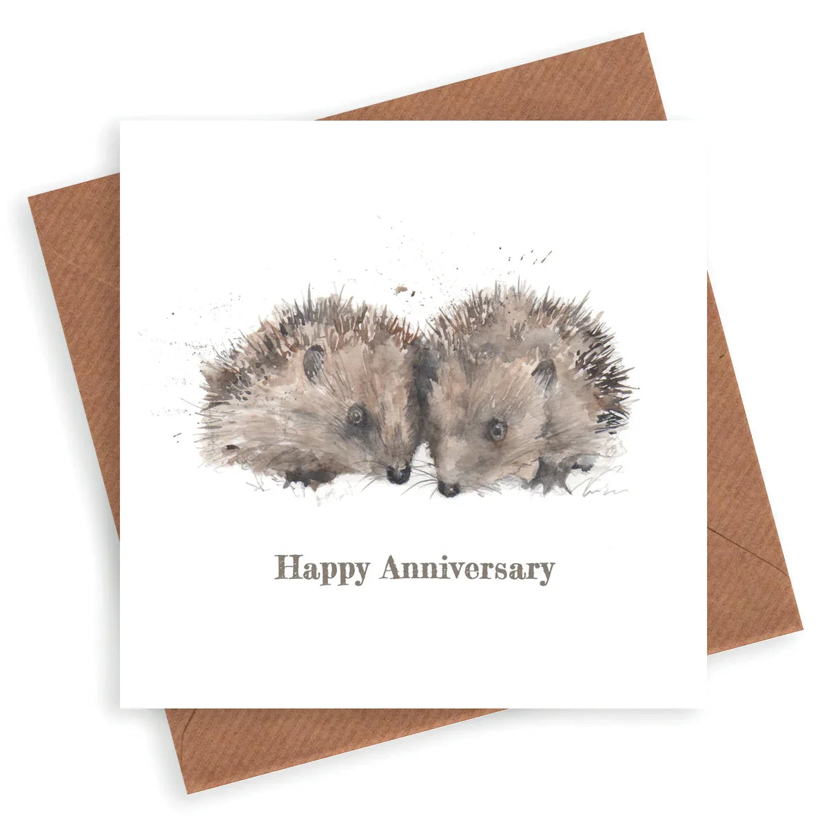 Handcrafted anniversary card with two illustrated hedgehogs and brown envelope