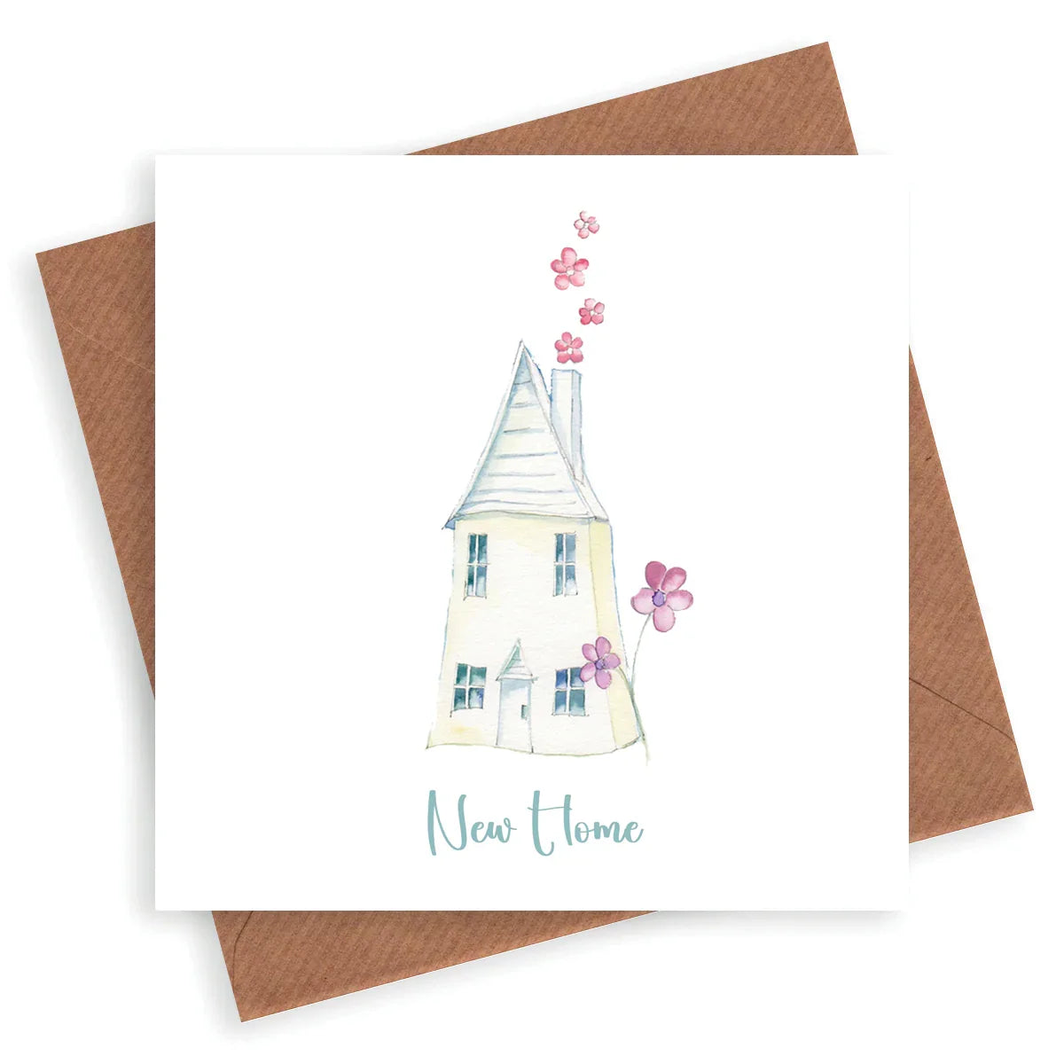 Handcrafted new home greeting card with watercolor house, pink flowers, and kraft envelope.