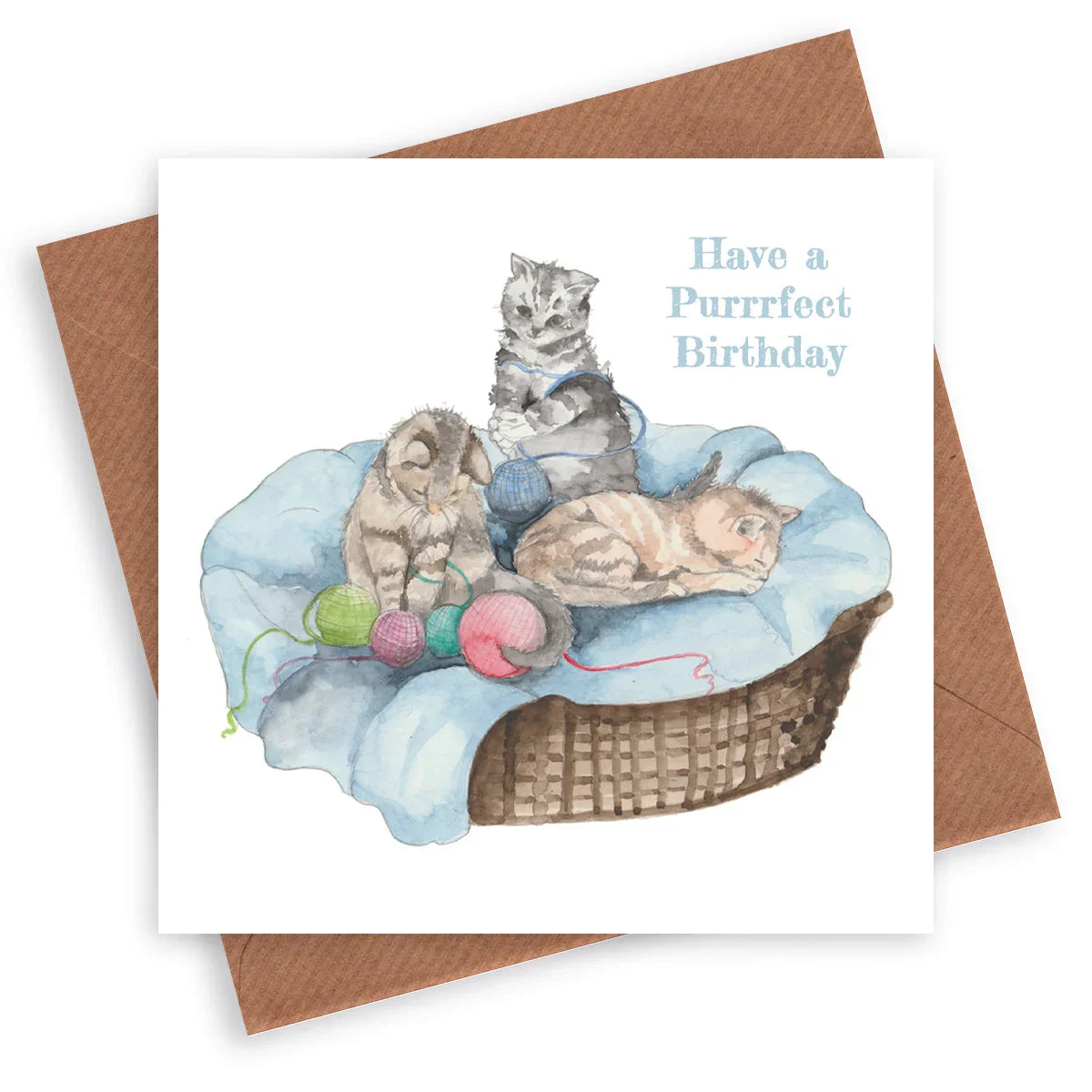 Birthday card with watercolor kittens and yarn on a blanket in a basket, reads Purrrfect Birthday