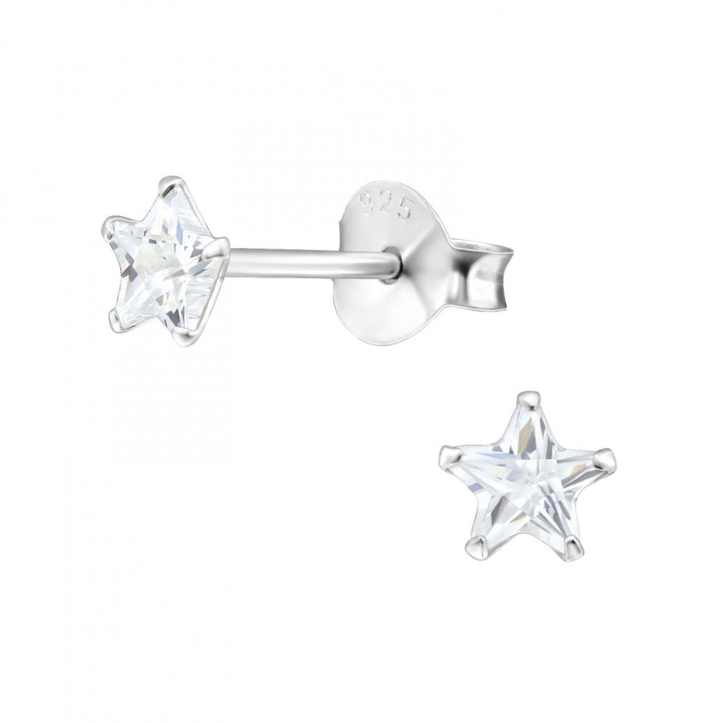 Star-shaped silver earrings with clear gemstones on a white background